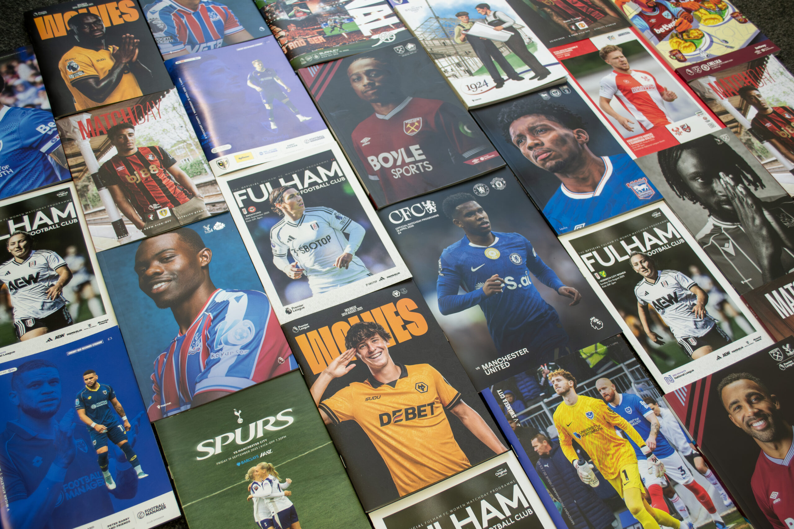 A photo showing all the different printed programmes.